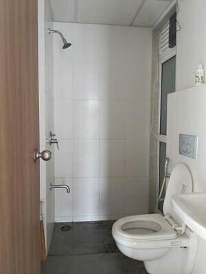 Bathroom in 1.5 BHK Apartment at Godrej Emerald, Ghodbunder Road – for Rent