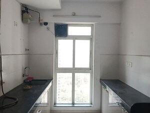 Kitchen in 1.5 BHK Apartment at Godrej Emerald, Ghodbunder Road – for Rent