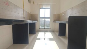 Kitchen in 2 BHK Apartment at Godrej Emerald, Ghodbunder Road – for Rent