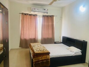 Bedroom in 2 BHK Apartment at Ajax Global Lifestyle, Kharadi – for Rent