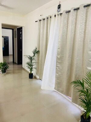 Building Lobby in 2 BHK Apartment at Ajax Global Lifestyle, Kharadi – for Rent