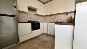 Kitchen in 2 BHK Apartment at Supertech Supernova Nova Residences, Sector 94 – for Rent