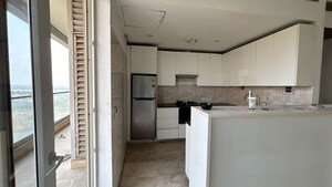 Kitchen in 2 BHK Apartment at Supertech Supernova Nova Residences, Sector 94 – for Rent