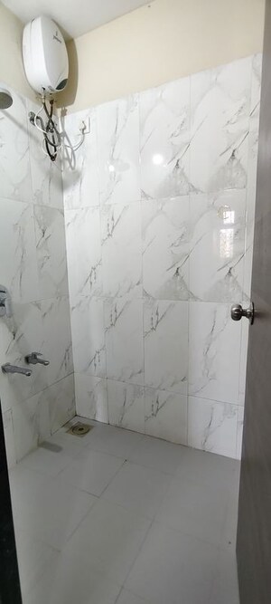 Bathroom in 1 BHK Apartment at Dosti Desire, Brahmand – for Rent