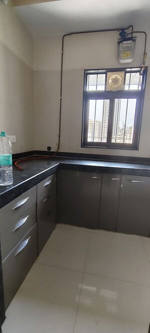 Kitchen in 1 BHK Apartment at Dosti Desire, Brahmand – for Rent