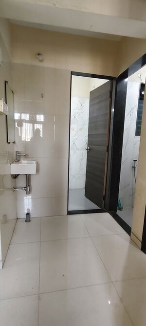 Bathroom in 1 BHK Apartment at Dosti Desire, Brahmand – for Rent