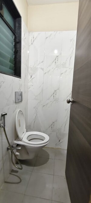 Bathroom in 1 BHK Apartment at Dosti Desire, Brahmand – for Rent