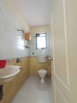 Bathroom in 2 BHK Apartment at Tilak Nagar Building, Tilak Nagar – for Rent