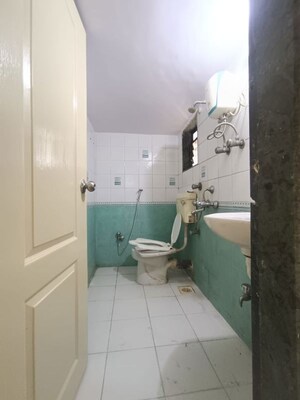 Bathroom in 2 BHK Apartment at Tilak Nagar Building, Tilak Nagar – for Rent