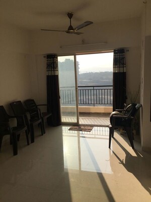 Living Room in 1 BHK Apartment at Puranik Abitante, Bavdhan – for Rent