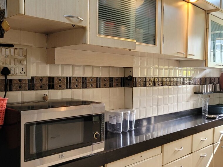 Kitchen, lokhandwala complex 2 Bedroom 900 Sq.Ft. Apartment In Lokhandwala Complex Mumbai 10360879