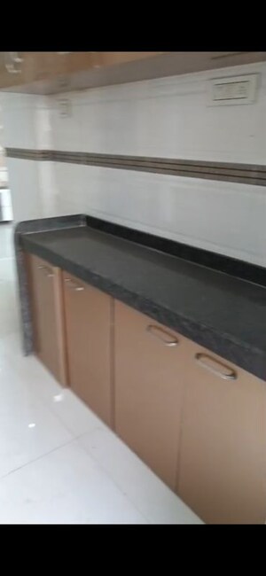 Kitchen in 2 BHK Apartment at Manohar Vikas Shreeji Paraiso Phase I, Badlapur East – for Sale