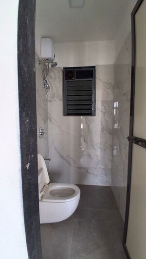Bathroom in 2 BHK Apartment at Atharva Om Gautam Residency, Malad East – for Rent
