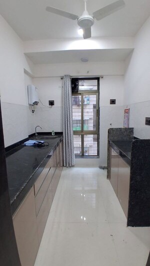 Kitchen in 1 BHK Apartment at Shiv Shakti Tower 28, Malad East – for Rent