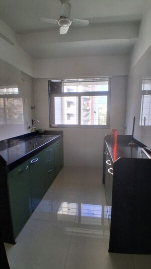 Kitchen in 1 BHK Apartment at Neev Galaxy, Malad East – for Rent