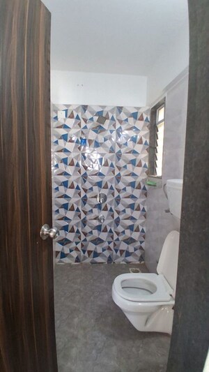 Bathroom in 1 BHK Apartment at Neev Galaxy, Malad East – for Rent