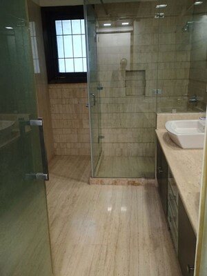 Bathroom in 3 BHK Builder Floor at Defence Colony – for Rent