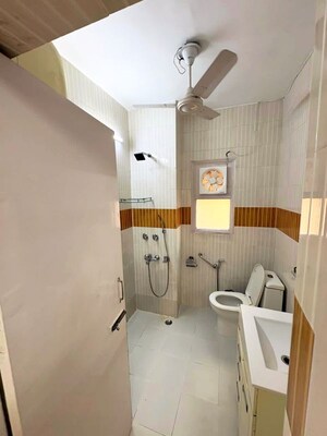Bathroom in 3 BHK Builder Floor at Kalkaji – for Rent