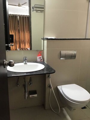 Bathroom in 4 BHK Apartment at Kolte Patil Tuscan Estate Signature Meadows, Kharadi – for Rent