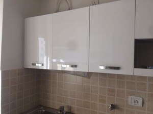 Kitchen in 2 BHK Apartment at Amrapali Silicon City, Sector 76 – for Rent