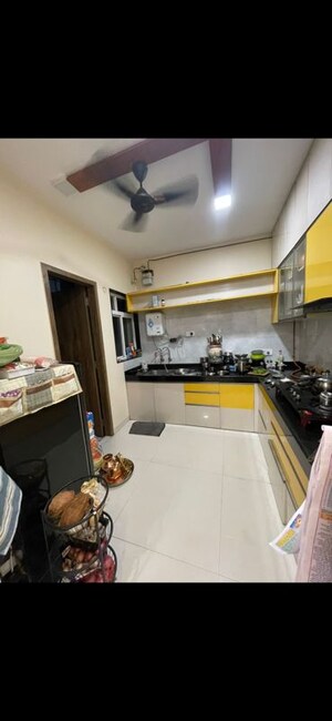 Kitchen in 3 BHK Apartment at Bhandari 7 Plumeria Drive, Tathawade – for Rent