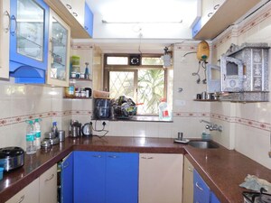 Kitchen in 2 BHK Apartment at Dhoot Sky Residency New Sonali CHSL, Malad West – for Rent