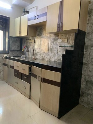 Kitchen in 2 BHK Apartment at Krishna Leela CHS Goregaon, Goregaon West – for Rent