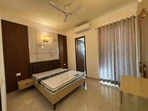 Bedroom in 2.5 BHK Builder Floor at Smart World Orchard, Sector 61 – for Rent