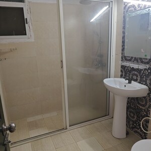 Bathroom in 3.5 BHK Apartment at Prateek Wisteria, Sector 77 – for Rent
