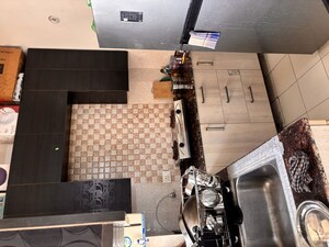 Kitchen in 2.5 BHK Apartment at Amrapali Adarsh Awas Yojna, Sector 76 – for Sale