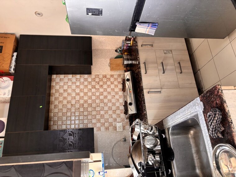 Kitchen, amrapali-adarsh-awas-yojna 2.5 Bedroom 1090 Sq.Ft. Apartment In Sector 76 Noida 10361316