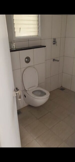 Bathroom in 2 BHK Apartment at Godrej Aqua, International Airport Road – for Rent