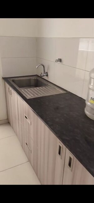 Kitchen in 2 BHK Apartment at Godrej Aqua, International Airport Road – for Rent