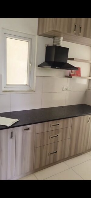 Kitchen in 2 BHK Apartment at Godrej Aqua, International Airport Road – for Rent