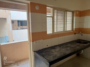 Kitchen in 2 BHK Apartment at Mangaltirth CHS, Ravet – for Rent