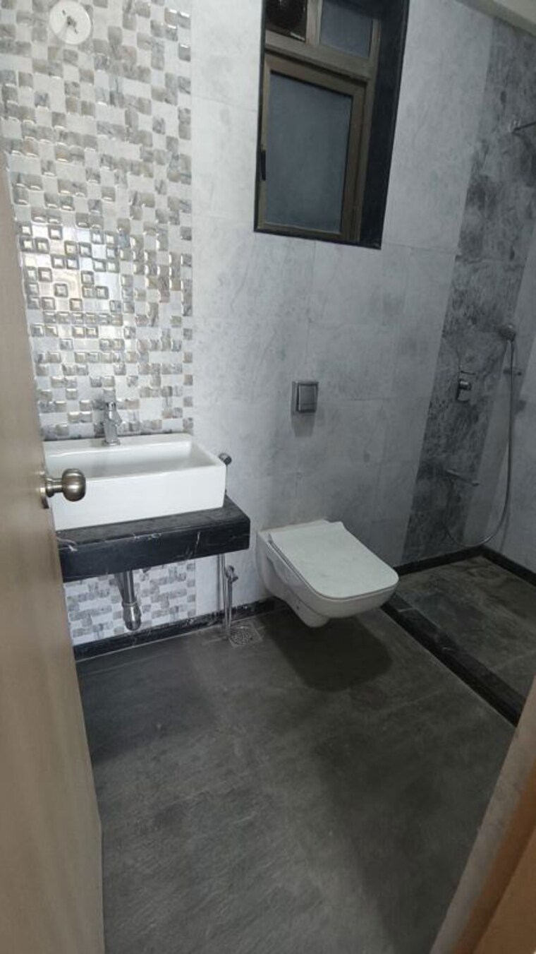 Bathroom, raj-infinia 2 Bedroom 750 Sq.Ft. Apartment In Malad West Mumbai 10361361