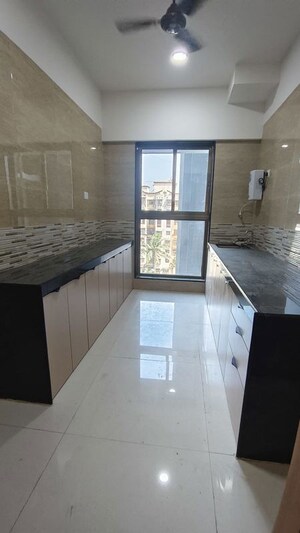 Kitchen in 2 BHK Apartment at Raj Infinia, Malad West – for Rent
