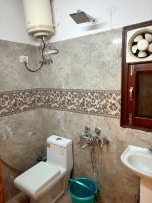 Bathroom in 3 BHK Builder Floor at Panchsheel Vihar – for Sale