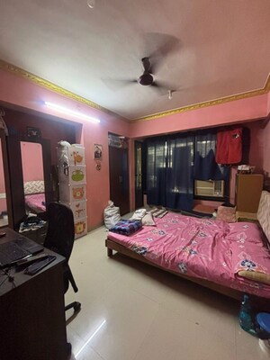 Bedroom in 2 BHK Apartment at Manyata CHS, Tilak Nagar – for Rent