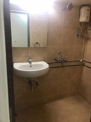 Bathroom in 2 BHK Apartment at Serenity Complex, Andheri West – for Rent