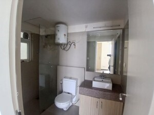 Bathroom in 3 BHK Apartment at Emaar MGF Garden Terraces, Sector 66 – for Rent