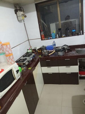 Kitchen in 2 BHK Apartment at Maa Enrich, Malad East – for Sale