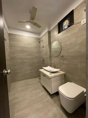 Bathroom in 4 BHK Builder Floor at Malka Ganj – for Sale