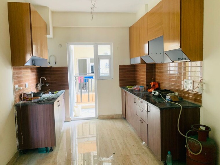 Kitchen, amrapali-centurian-park-phase-ii 3.5 Bedroom 1700 Sq.Ft. Apartment In Tech Zone 4 Greater Noida Greater Noida 10361829