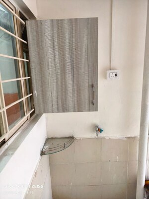 Bathroom in 2 BHK Apartment at Anand Green Crest, Hadapsar – for Rent