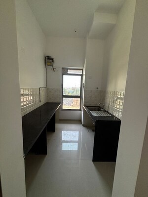 Kitchen in 1 BHK Apartment at Kalpataru Immensa D, Kolshet Road – for Sale