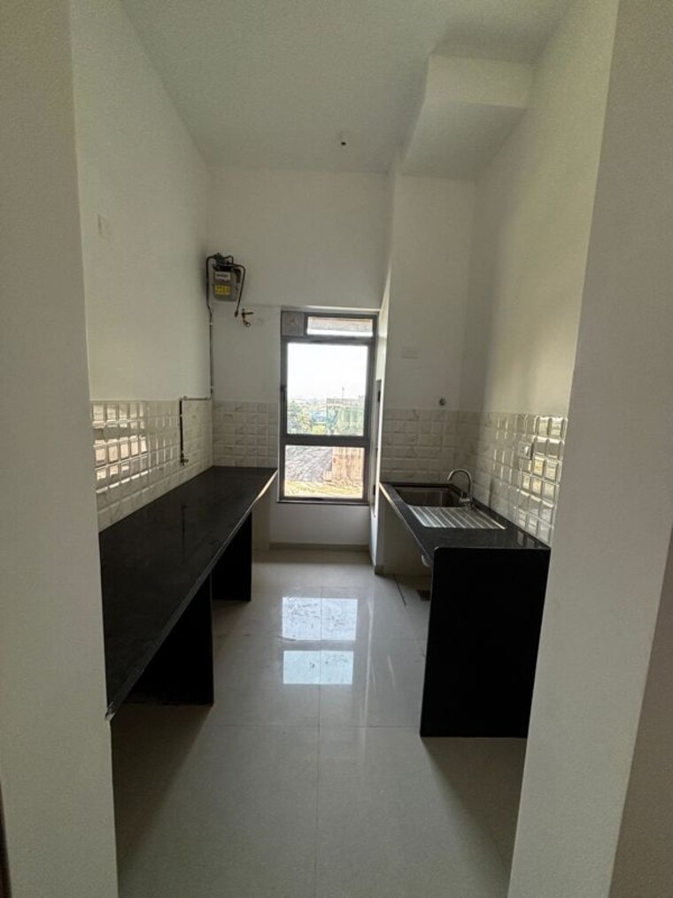 Kitchen, kalpataru-immensa-d 1 Bedroom 450 Sq.Ft. Apartment In Kolshet Road Thane 10361891