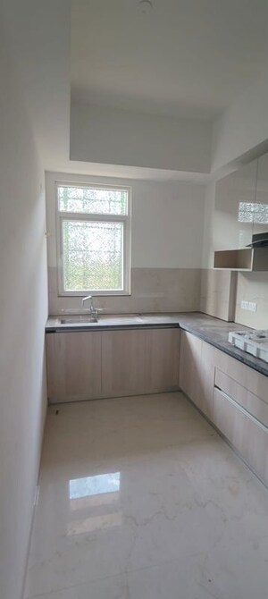 Kitchen in 2 BHK Builder Floor at Smart World Orchard, Sector 61 – for Rent