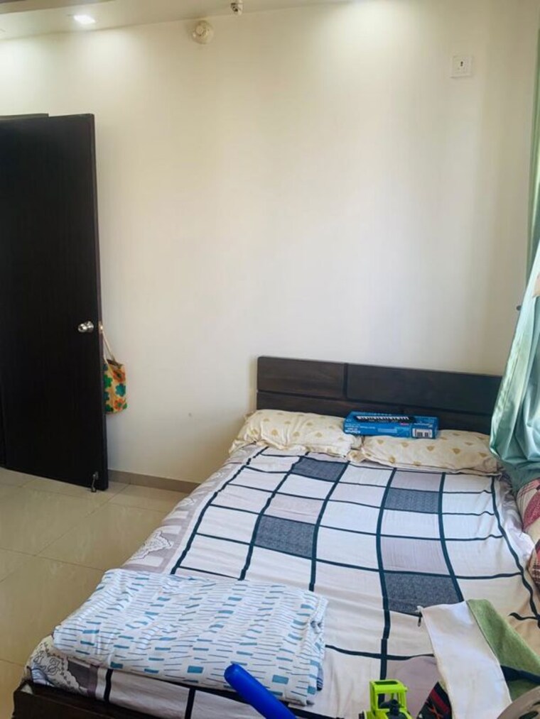 Bedroom, amanora-future-towers 2 Bedroom 1000 Sq.Ft. Apartment In Hadapsar Pune 10361919