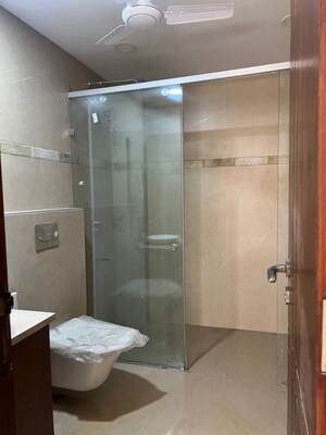 Bathroom in 4 BHK Builder Floor at Roop Nagar – for Sale